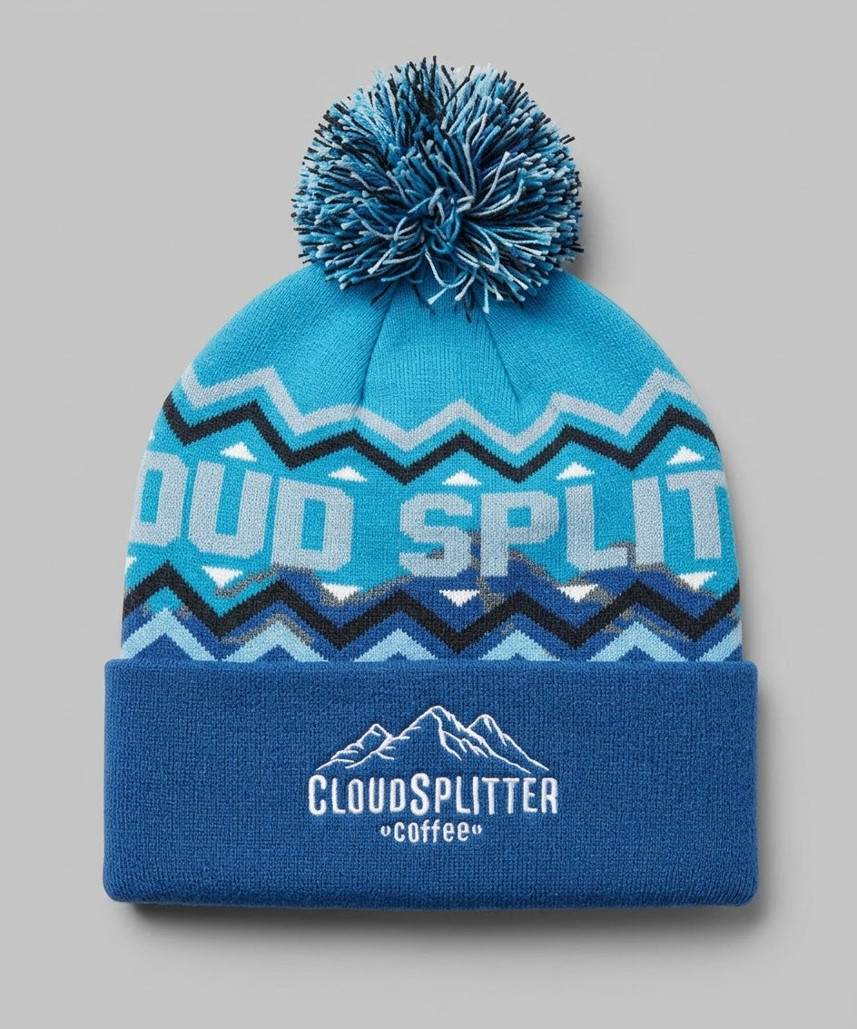 CloudSplitter Coffee x BOCO Gear blue geometric winter pom beanie with embroidered mountain cuff logo